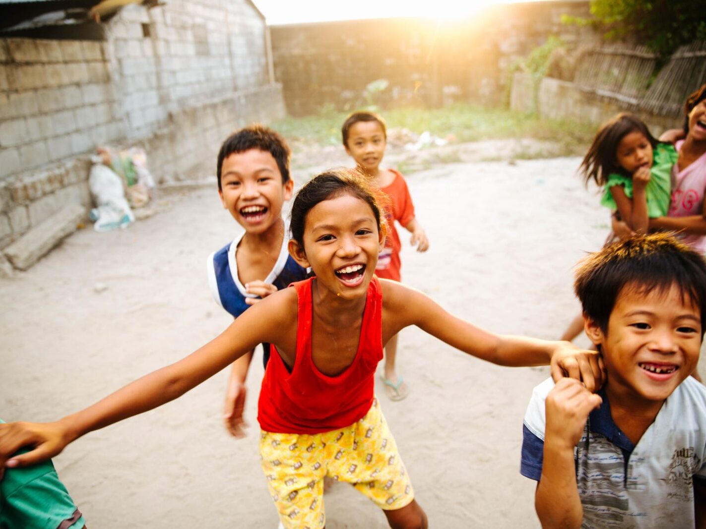 group of children laughing together